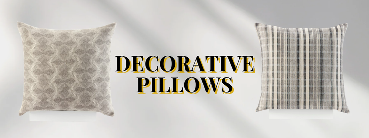 Decorative Pillows banner with Striped pattern pillow on the right and coffee coloured pillow with a diamond pattern on the left