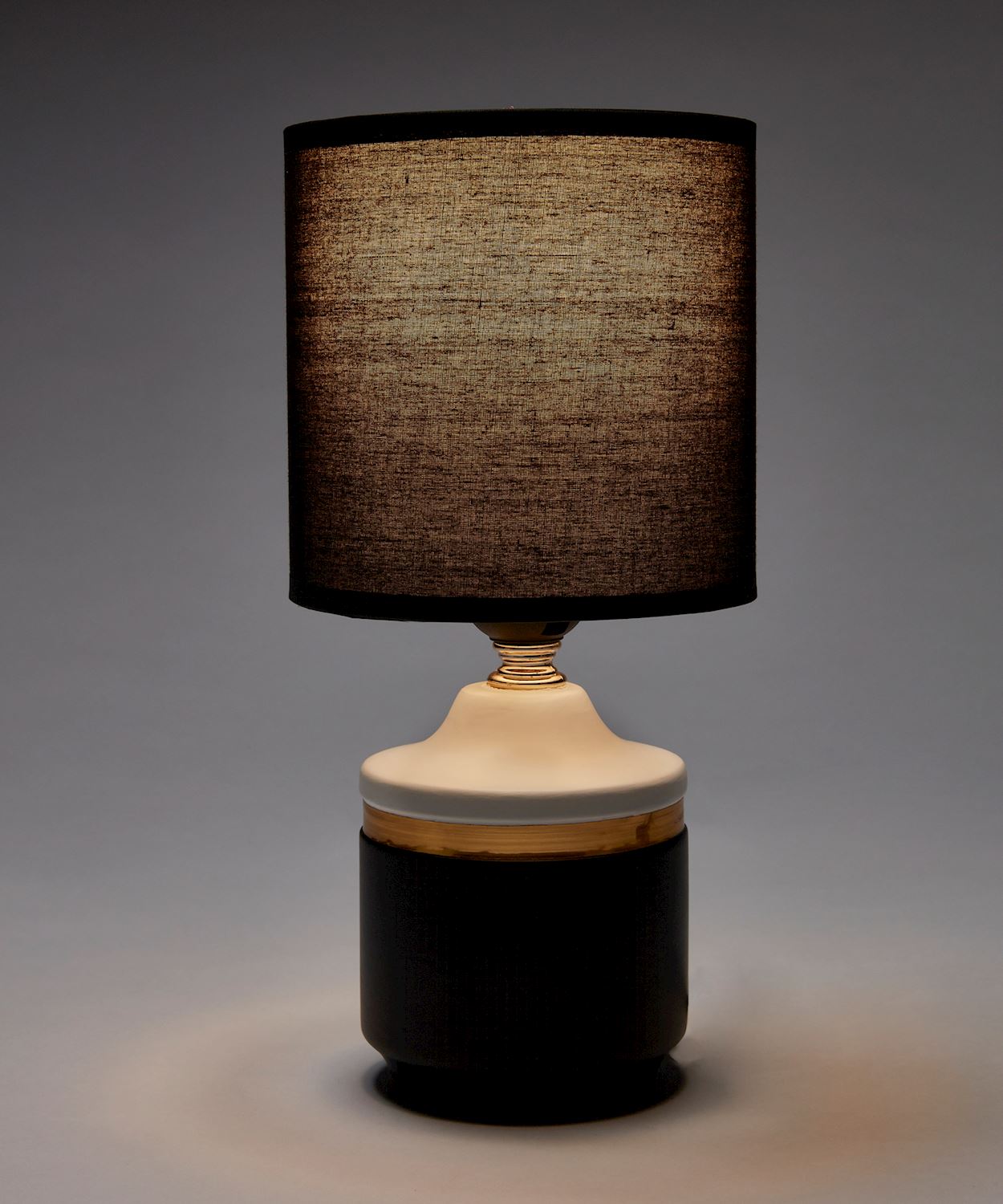 Black and White Table Lamp with light illuminated