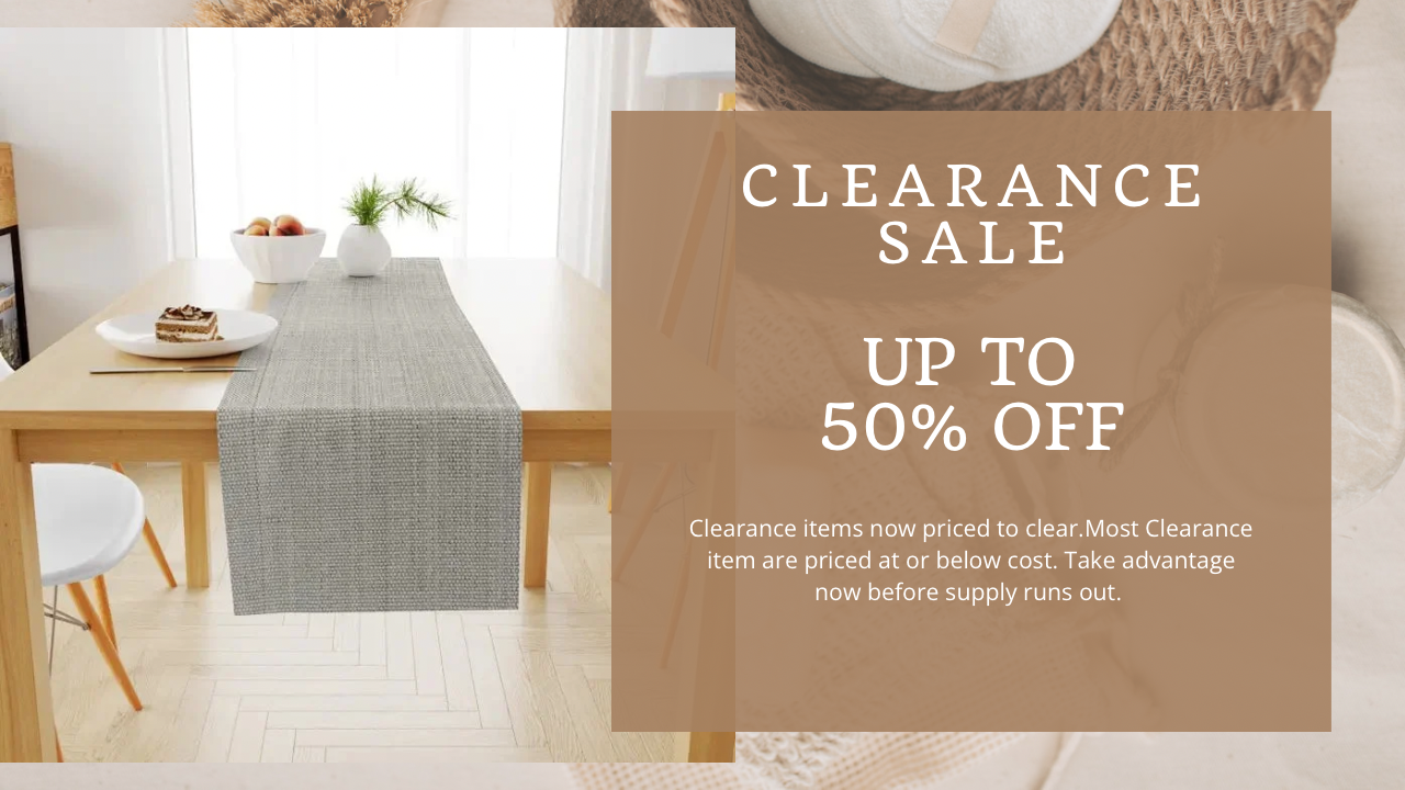 Dining room with a table set for a meal, featuring a clearance sale banner.