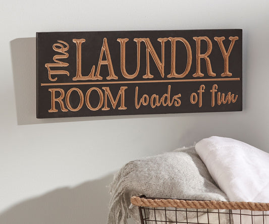 Black and Gold Sign with text reading Laundry Room Loads of Fun
