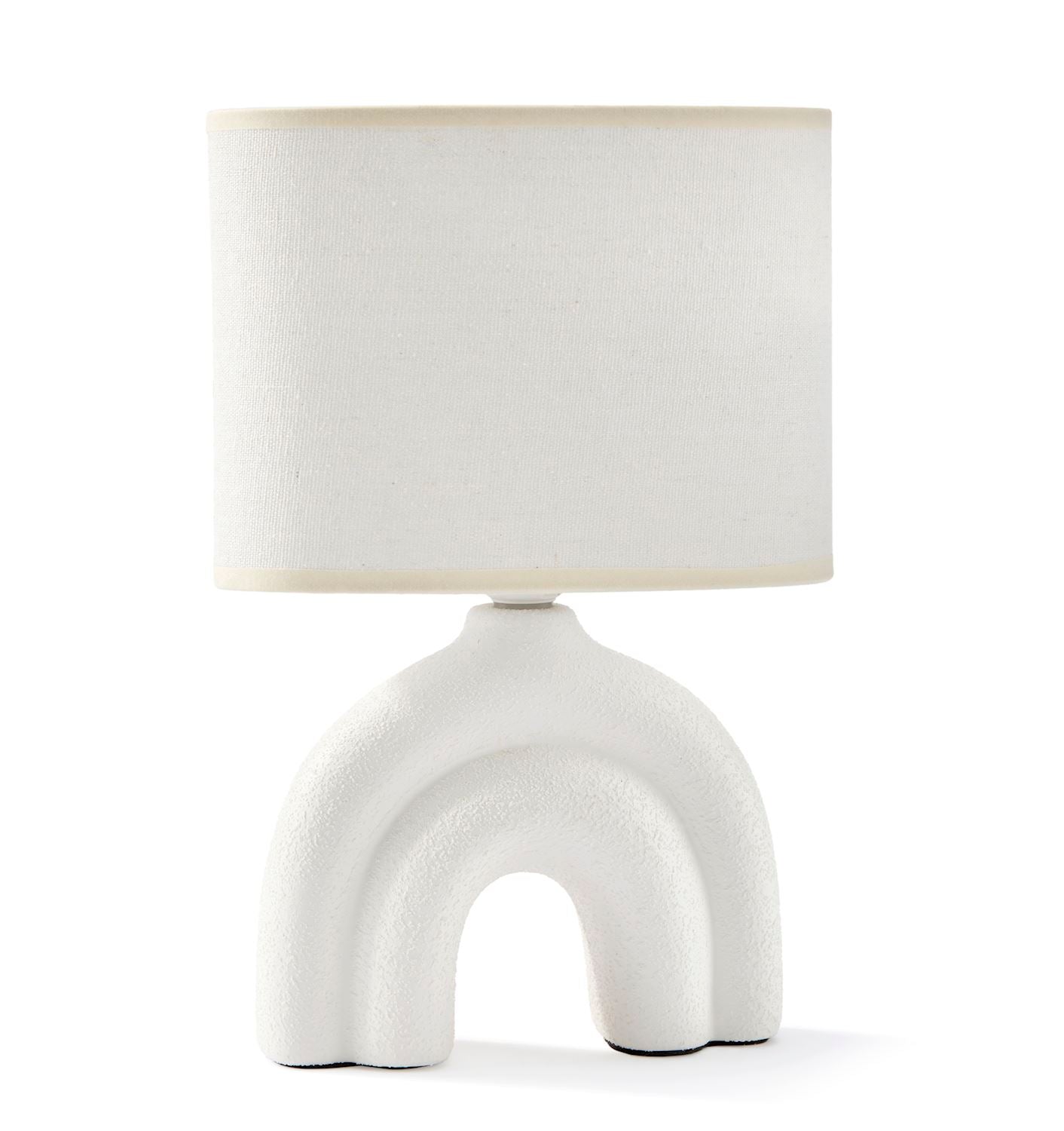 A white ceramic table lamp with a textured base and a white polyester shade, displayed against a plain background.